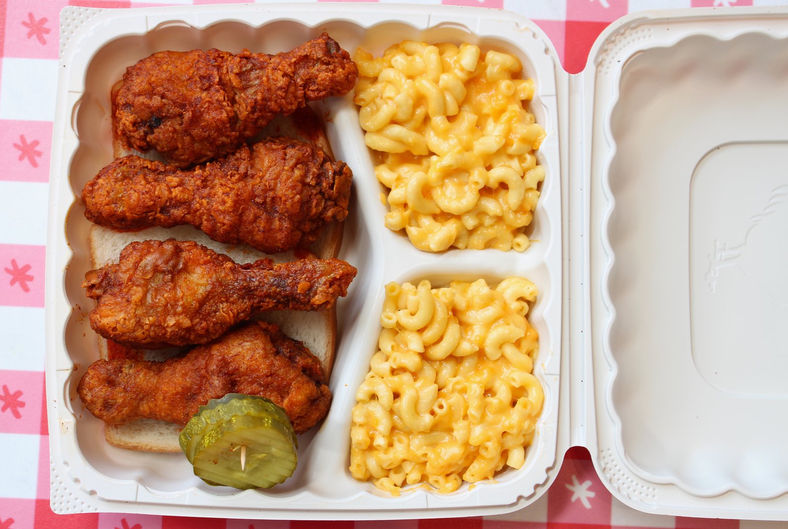 Nashville hot chicken drumsticks, a real photograph.