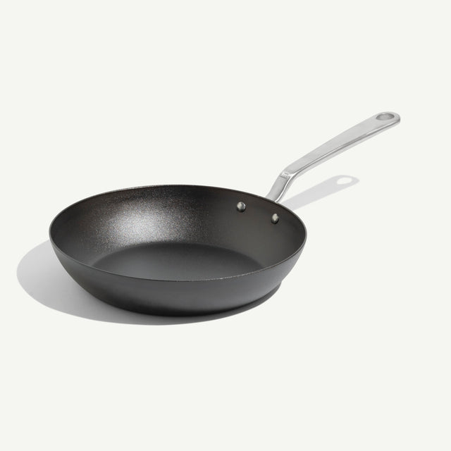 A carbon steel frying pan.