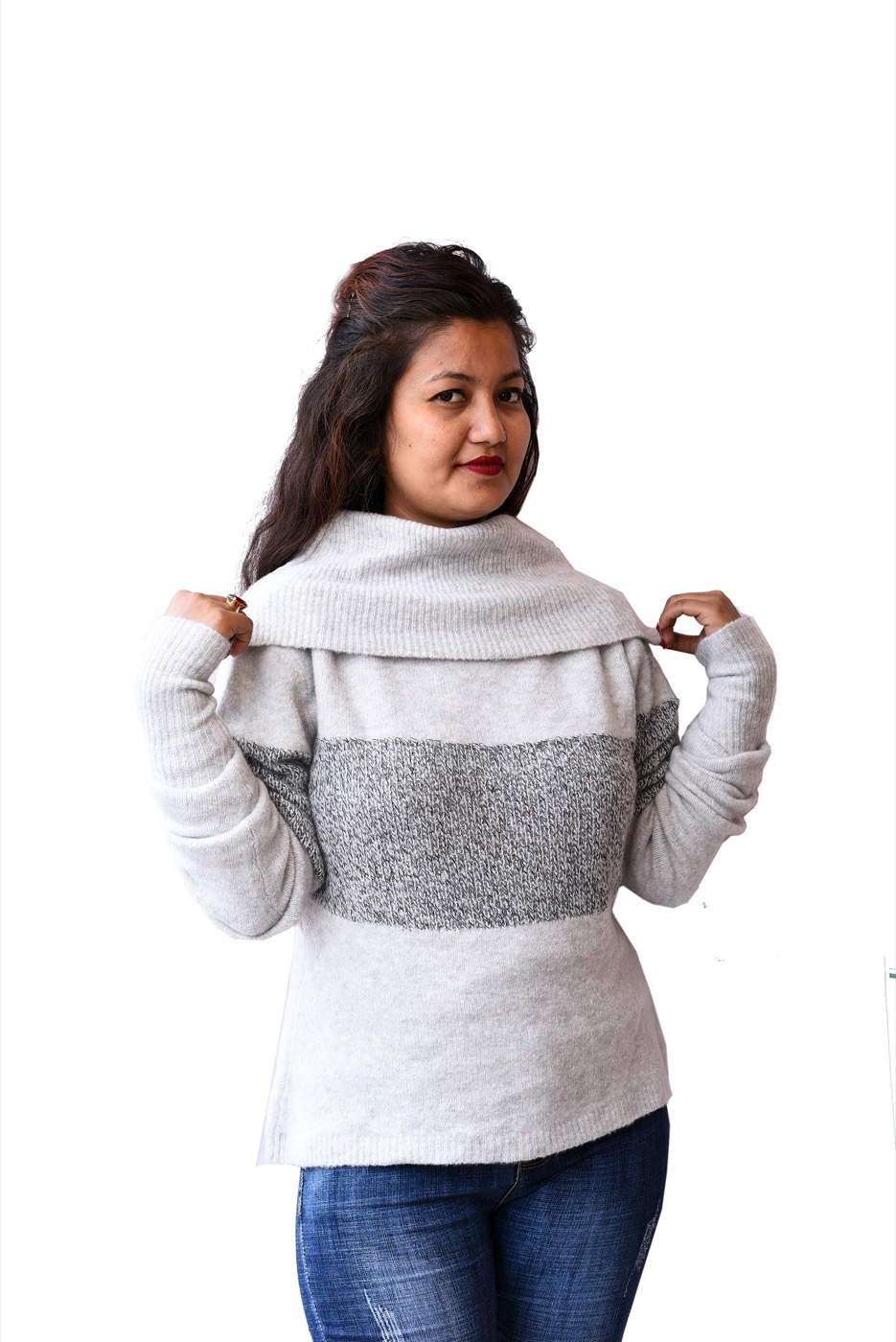 A neutral cashmere knit sweater.