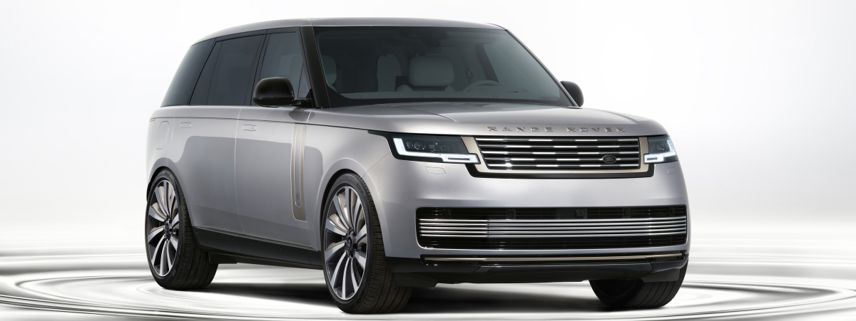 2027 Range Rover SV Ultra in silver, studio shot.
