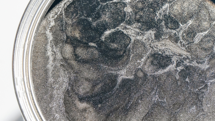 Close-up swatch of Titan Silver paint, exclusive to the Range Rover SV Ultra.