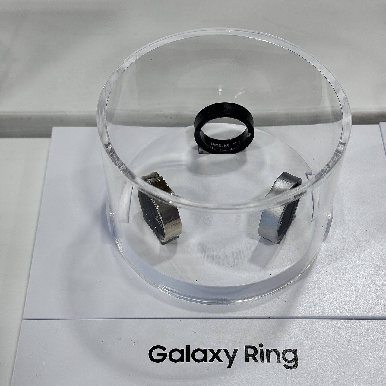 Samsung Galaxy Ring, a titanium smart ring, real product photograph.