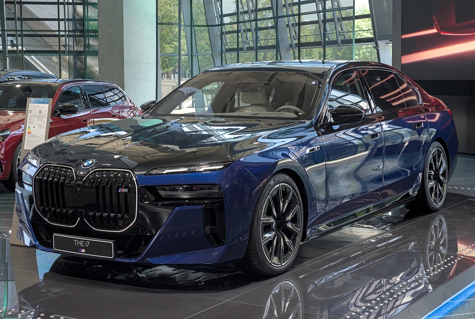 BMW i7 luxury electric sedan, editorial photograph.