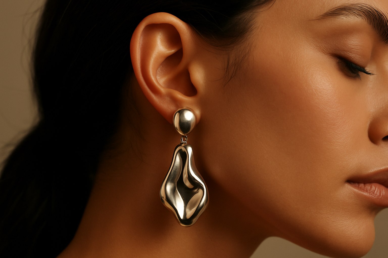 Editorial close-up of a fictional model wearing a statement earring