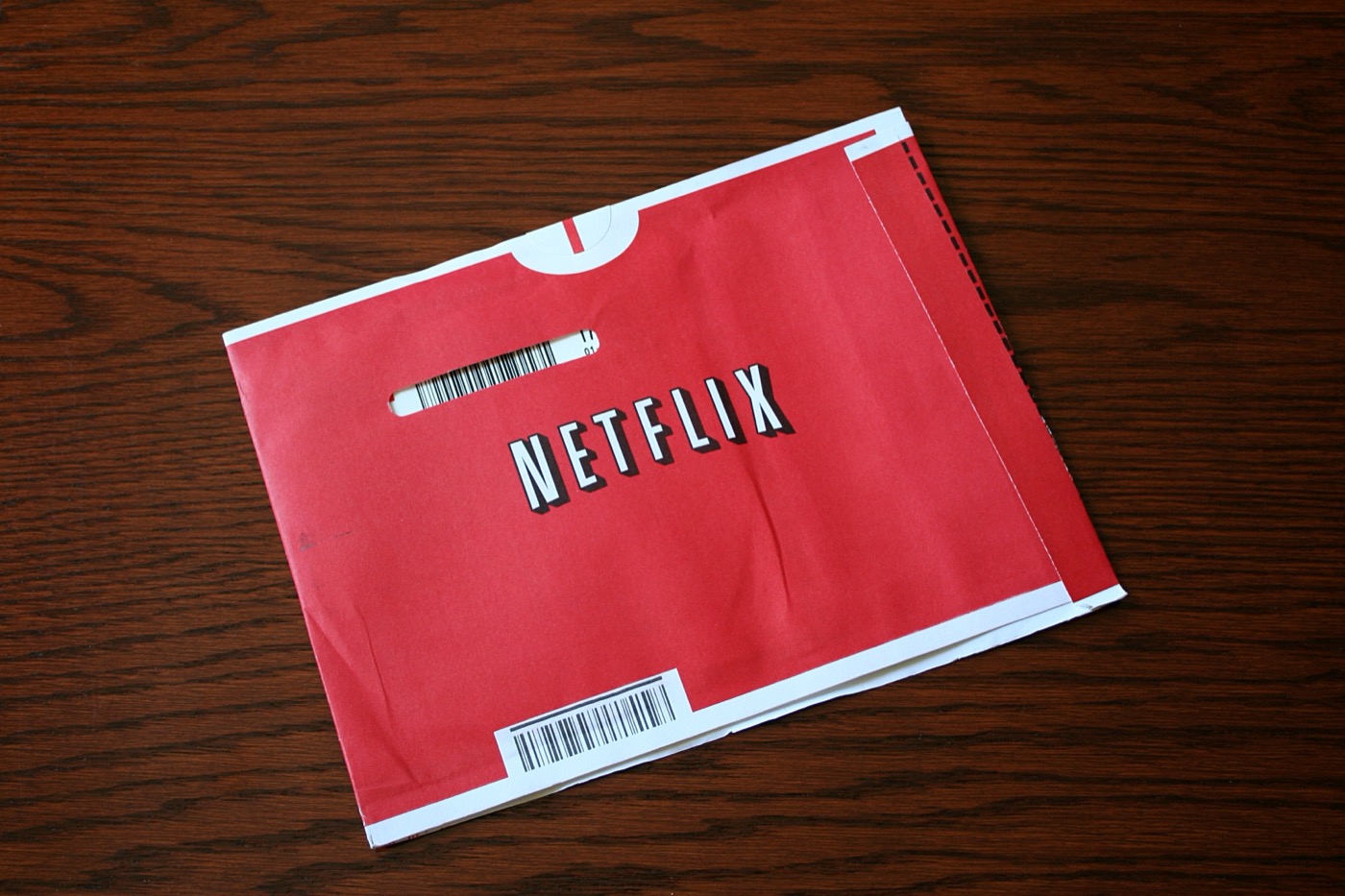A red Netflix DVD-by-mail envelope.