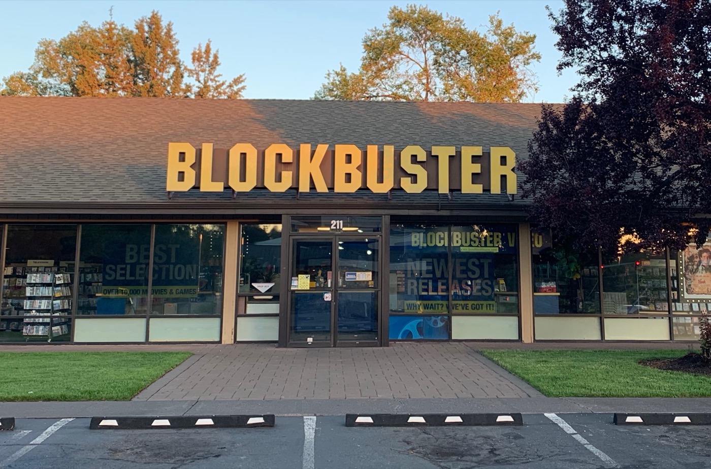 The storefront of the last Blockbuster Video, in Bend, Oregon, with its blue and yellow signage.