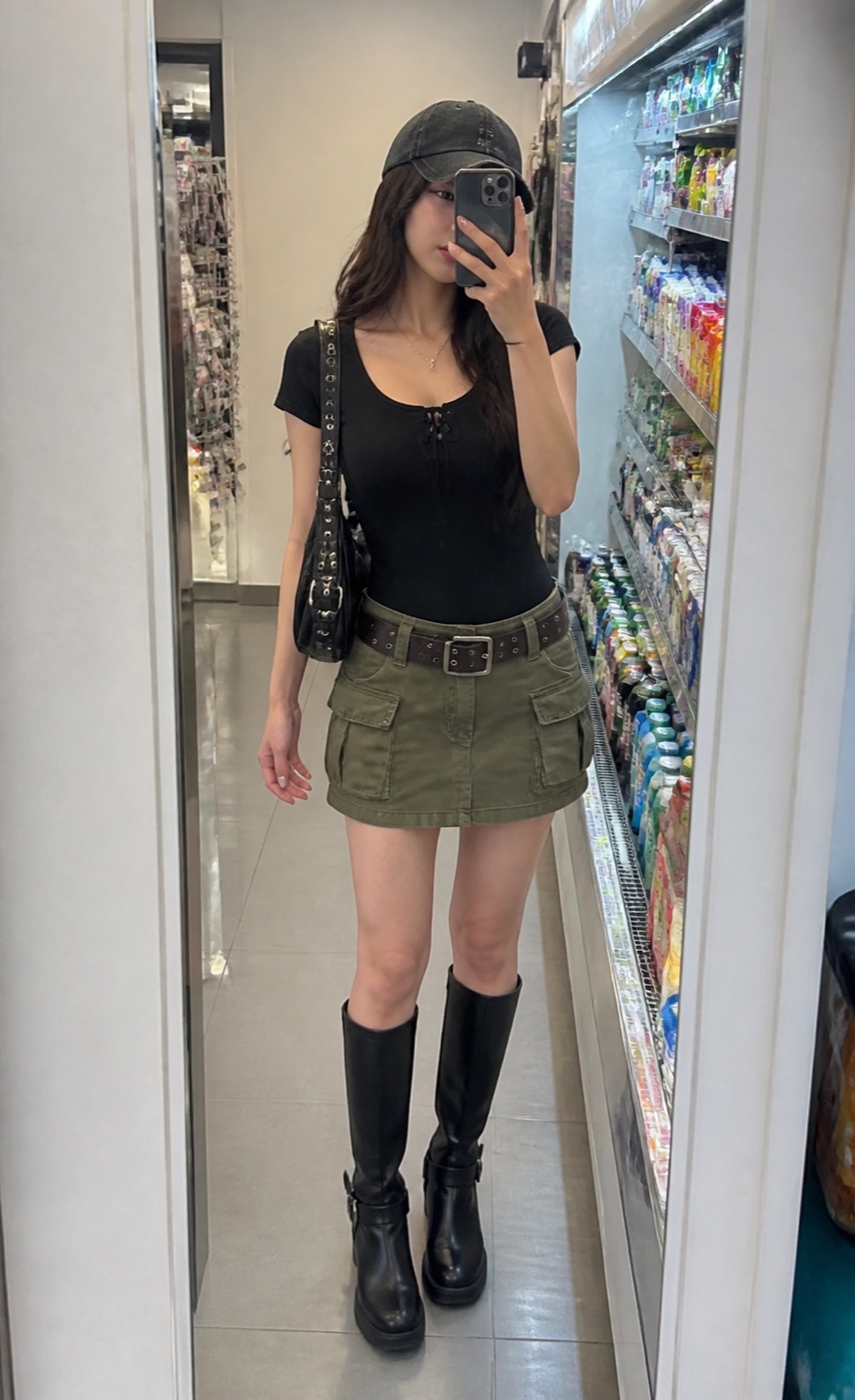 Outfit with Black Lace-Up Bodysuit, Olive Utility Mini Skirt, Black Knee Boots curated by @dopasnap