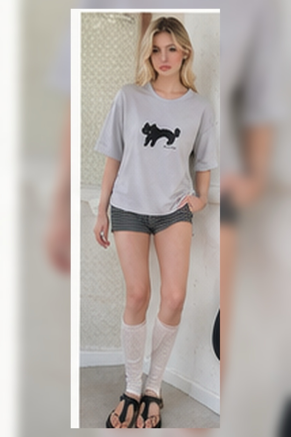 Outfit with Gray graphic T-shirt, White lace long-sleeve layer, Striped micro shorts curated by @dopasnap