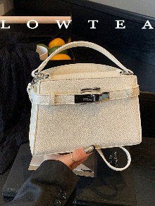 Ivory rectangular shoulder bag with black strap